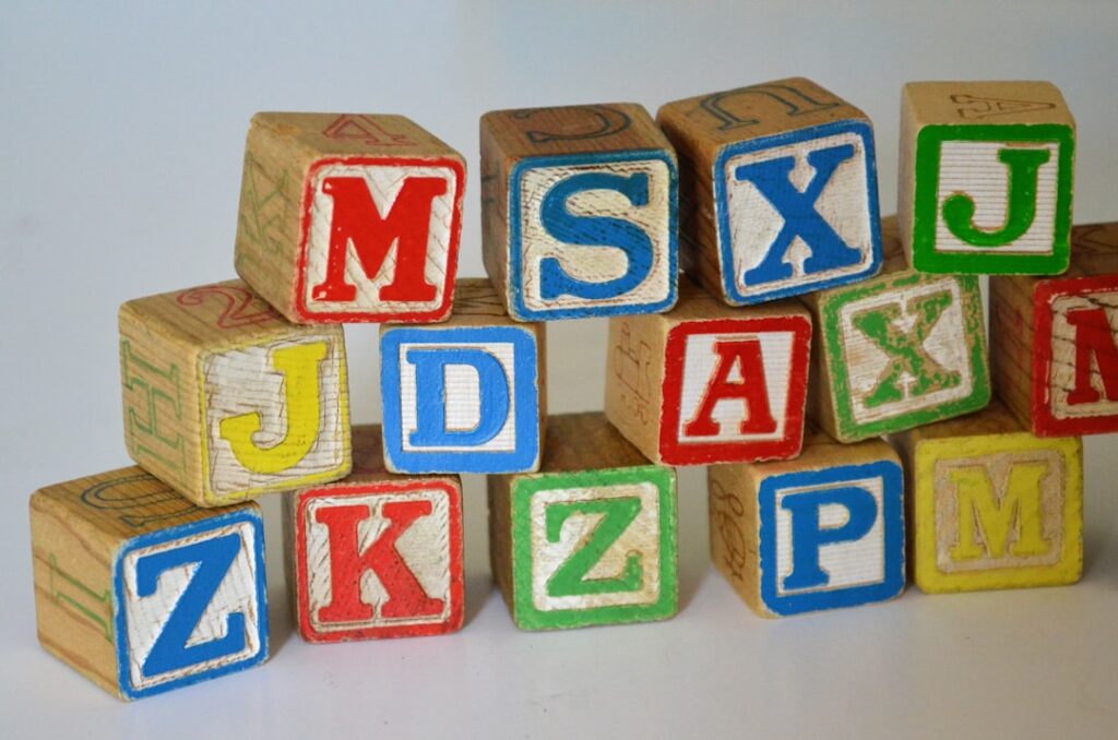 Stacked wooden alphabet blocks