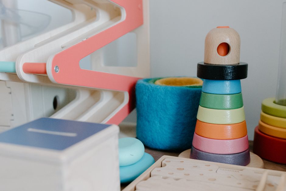 Wooden stacking toys on a shelf